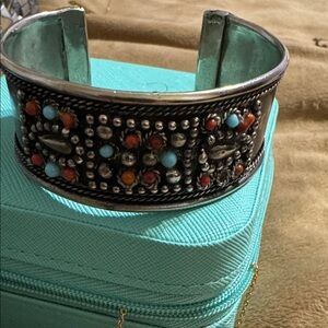 Bohemian FauxSilver Cuff Bracelet with Turquoise color
and Red Accents